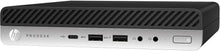HP Mini Refurbished Desktop AMD A10 tiny PC with black casing and front ports, compact size ideal for space-saving computing.