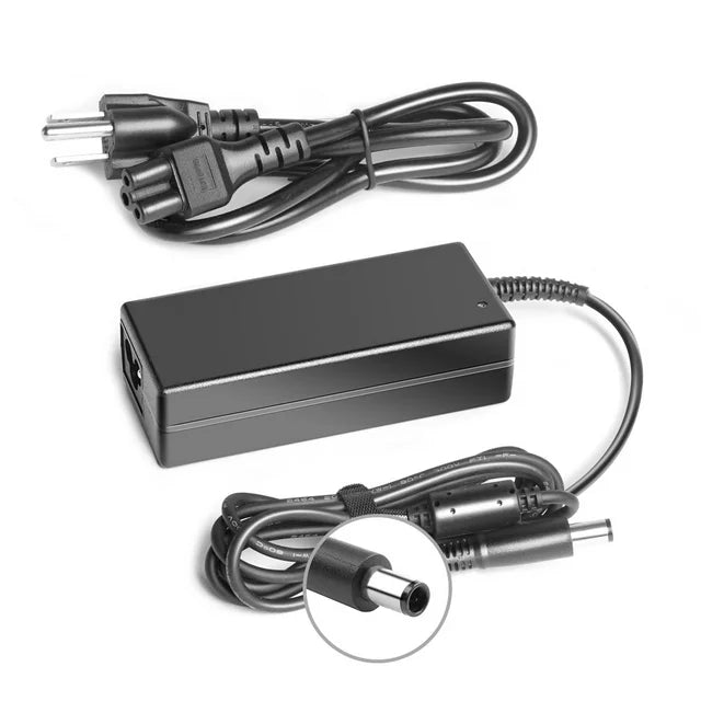 Dell 65W 19.5V 3.34A AC adapter with 7.4mm connector, compatible with Dell laptops, shown in the image.