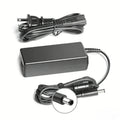 HP 65W 19.5V 3.33A AC Adapter with 7.4mm connector for HP laptops, compact and reliable power supply.