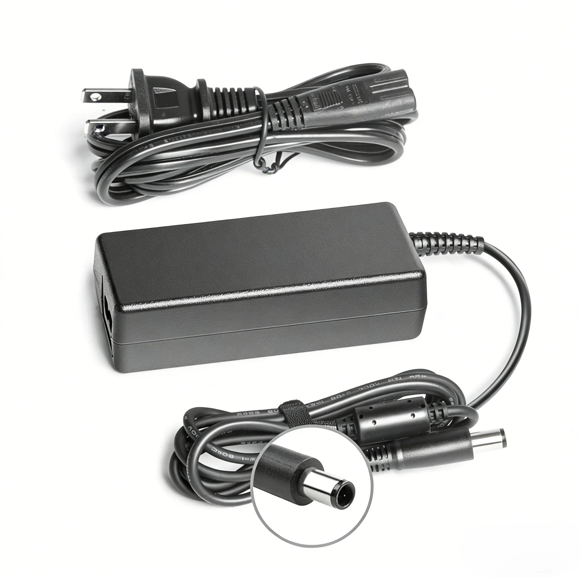 HP 65W 19.5V 3.33A AC Adapter with 7.4mm connector for HP laptops, compact and reliable power supply.