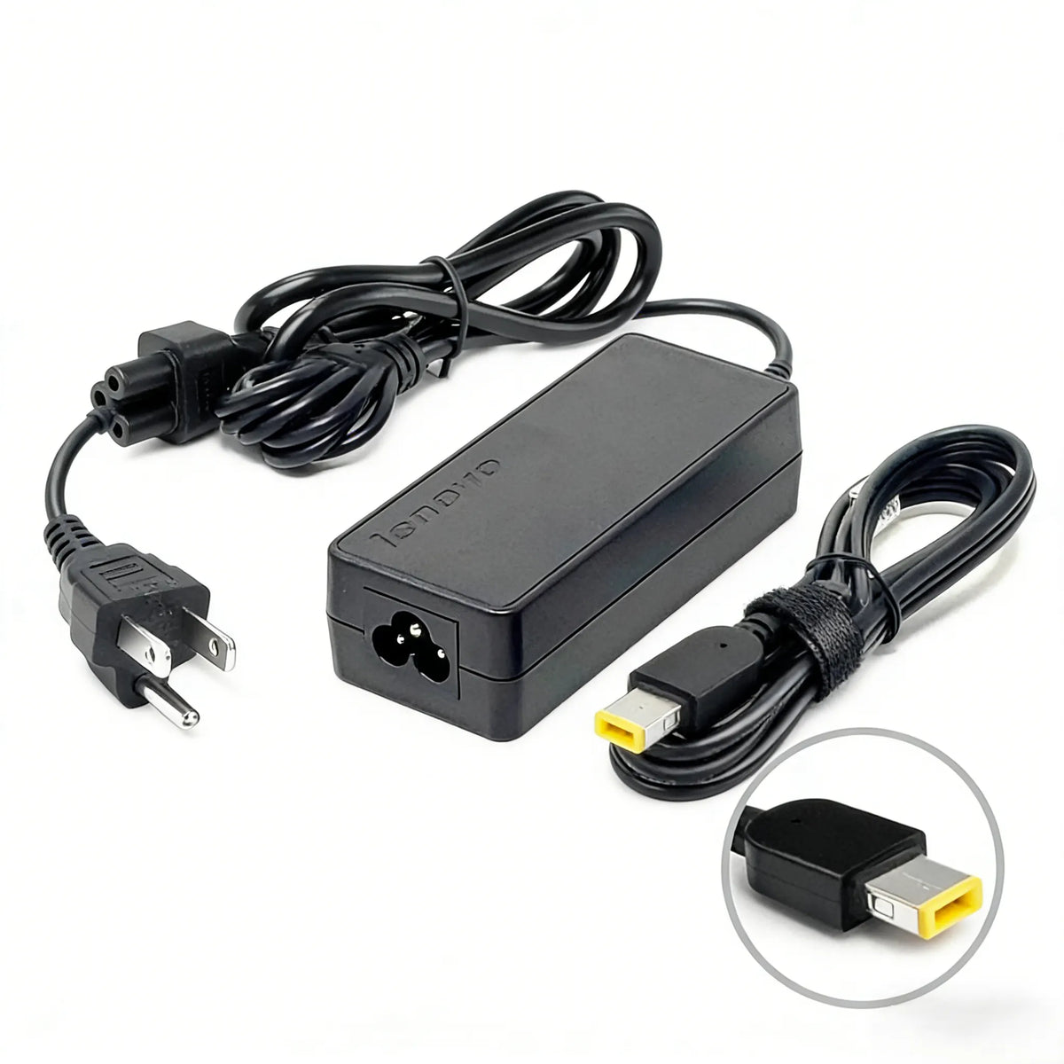 Lenovo 65W 20V 3.25A AC adapter with slim tip, compact power supply for compatible laptops and devices.